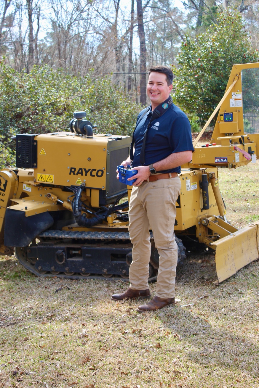 Joey Milner with stump grinder